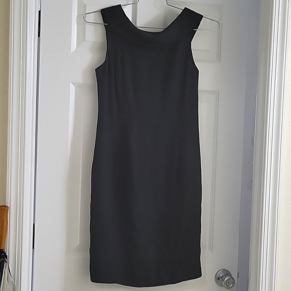 Little Black Dress. Shawl collar, V-shape, zipper in  back of dress.